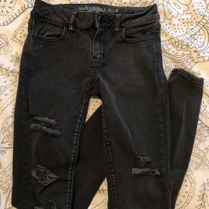 Distressed black jeans